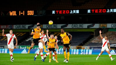 Wolves striker Raul Jimenez (2nd L) scores with this header but it is disallowed for offside. AFP