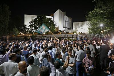 Supporters of Pakistani opposition parties celebrate after Supreme Court decision, in Islamabad, Pakistan, Thursday, April 7, 2022. AP