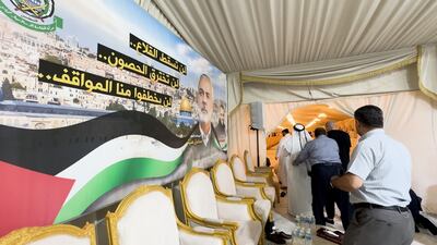 Visitors enter the mourning tent of Hamas political leader Ismael Haniyeh in Doha on August 4. Mahmoud Rida / The National