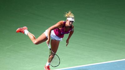 Coco Vandeweghe of the USA in action against Karolina Pliskova of Czech Republic during Day 1 of the WTA Dubai Duty Free Tennis Championship at the Dubai Duty Free Stadium on February 15, 2016. (Photo by Francois Nel/Getty Images)
