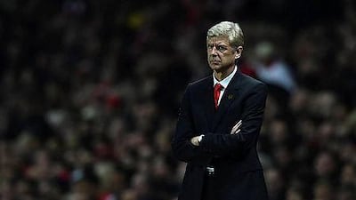 Arsene Wenger, Manager of Arsenal, looks on during their Premier League match against Manchester United at Emirates Stadium on November 22, 2014 in London, England. Shaun Botterill/Getty Images