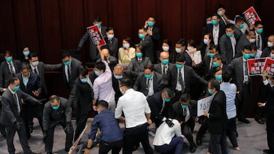 Pro-establishment politician Starry Lee, centre, amid a scuffle during the Hong Kong Legislative Council's House Committee meeting on May 8, 2020. AP Photo