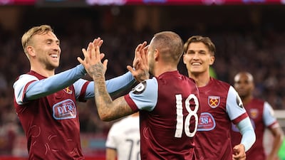 West Ham's Danny Ings, right, is congratulated by Jarrod Bowen after scoring the opening goal against Tottenham Hotspur during the pre-season friendly at Optus Stadium in Perth, Australia, on July 18, 2023. West Ham won the game 3-2. EPA