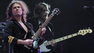 Dave Keuning, left, and Mark Stoermer of The Killers perform during the Coachella Valley Music & Arts Festival in Indio, California in April 2009.