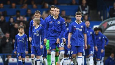 John Terry leads Chelsea out for the FA Cup third round tie. Shaun Botterill / Getty Images