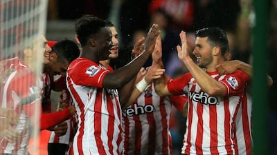 Shane Long of Southampton celebrates scoring a goal with Victor Wanyama during their 2-0 Premier League win over Leicester City on Saturday at St Mary's Stadium. David Cannon / Getty Images / November 8, 2014