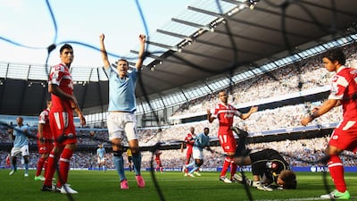 Yaya Toure scores the opening goal at Etihad Stadium against QPR. Clive Brunskill/Getty Images