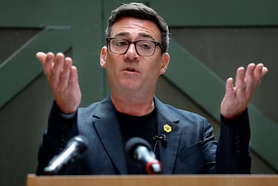 Andy Burnham delivers his speech on economics. Getty Images