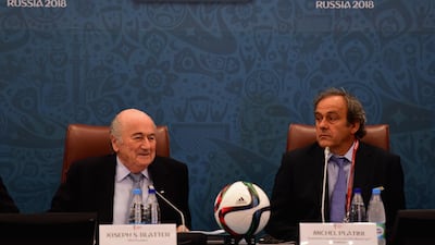 Former FIFA President Sepp Blatter and former UEFA President Michel Platini in 2015. (Photo by Shaun Botterill/Getty Images)