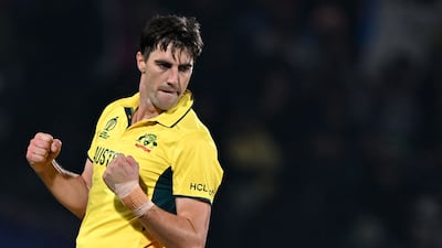 Australia's captain Pat Cummins celebrates after taking the wicket of New Zealand's Matt Henry. AFP