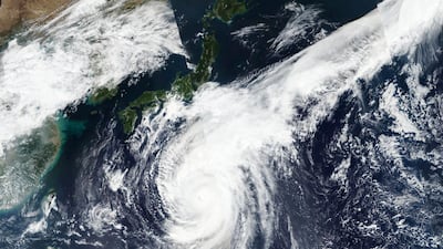 This Oct. 10, 2019, satellite photo taken by NASA-NOAA's Suomi NPP satellite shows typhoon Hagibis approaching Japan. NASA Worldview, Earth Observing System Data and Information System. AP