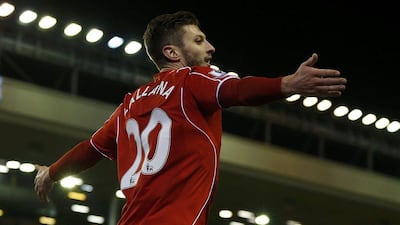 Liverpool's Adam Lallana celebrates his second goal, making it 3-1 against Swansea City in the Premier League on Monday. Phil Noble / Reuters