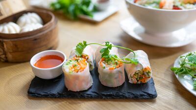 Cold goi cuon tom rolls are made from rice paper rolls, cooked shrimp, lettuce and herbs.