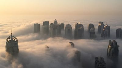 Fog covered parts of Dubai skyline on Monday and more fog is expected on Tuesday. Rene Slama / AFP