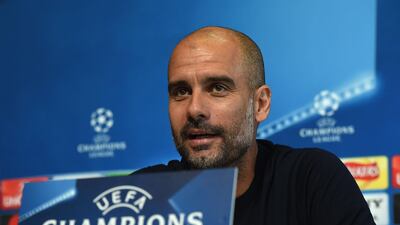 Pep Guardiola speaks to the media ahead of Manchester City's Uefa Champions League quarter-final second leg against Liverpool. Paul Ellis / AFP