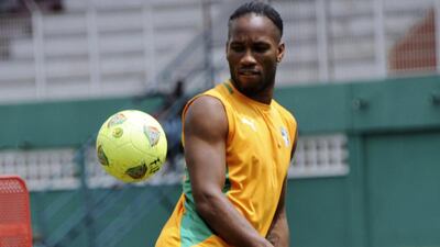 Didier Drogba has earned 99 caps with Ivory Coast and will make appearance No 100 at the 2014 World Cup. Sia Kambou / AFP