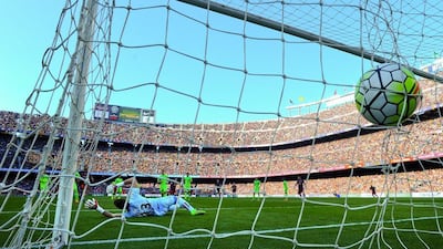 Lionel Messi of FC Barcelona scores his team’s fourth goal during the La Liga match between FC Barcelona and Getafe CF at Camp Nou on March 12, 2016 in Barcelona, Spain. (Photo by David Ramos/Getty Images)