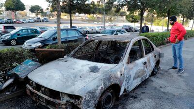 Destroyed cars are pictured in central Beirut on December 18, 2019. AFP