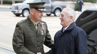 Joint Chiefs Chairman Gen. Joseph Dunford greets defence secretary James Mattis at the Pentagon. Mr Mattis spoke with Saudi Arabia's defence minister, Deputy Crown Prince Mohammed bin Salman on the phone on Tuesday. (AP Photo/Alex Brandon, File)