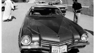 A Chevrolet Camaro outside the walls of Qasr Al Hosn in 1974. Jack Burlot
