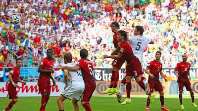 Mats Hummels of Germany scores on a header for his team's second goal against Bruno Alves and Pepe of Portugal during their2014 World Cup Group G match on Monday in Salvador, Brazil. Martin Rose / Getty Images