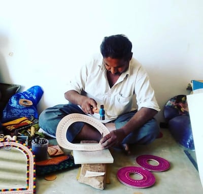 Devji Poonja creating in his small leather workshop. Photo: Devji Poonja