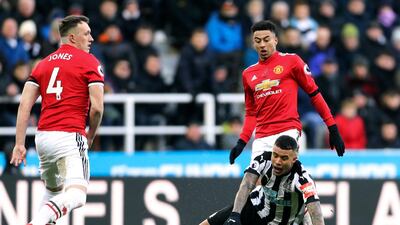 Phil Jones, left, was bitterly disappointed after Manchester United were beaten at St James' Park. Owen Humphreys / AP Photo