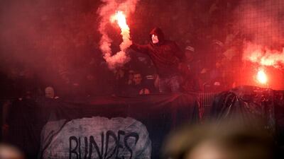 Hamburg's fans light flares at the end of the German Bundesliga soccer match between Hamburger SV vs Borussia Moenchengladbach in Hamburg, Germany, on May 12, 2018. Srdjan Suki / EPA
