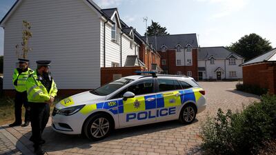 Police officers guard the entrance to a housing estate on Muggleton Road, after it was confirmed that two people had been poisoned with the nerve-agent Novichok, in Amesbury. Henry Nicholls/ Reuters