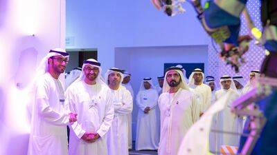 Sheikh Mohammed bin Zayed and Sheikh Mohammed bin Rashid observe some of the main features of the Museum of Future Government Services. Seen with Sheikh Hazza bin Zayed Al Nahyan National Security Advisor for the UAE and Vice Chairman of the Abu Dhabi Executive Council. Ryan Carter / Crown Prince Court - Abu Dhabi