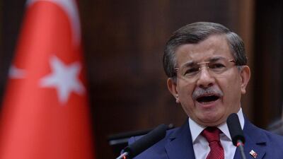 Turkey's Prime Minister Ahmet Davutoglu addresses his lawmakers at the parliament in Ankara. AP Photo