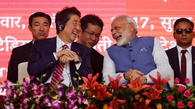 a partnership that runs on rails? Japanese Prime Minister Shinzo Abe, left, and Indian Prime Minister Narendra Modi laugh during the launch of work on a high-speed train line in the western Indian state of Gujarat, in Ahmadabad, India, on Thursday, September. 14, 2017. The 500-kilometre project will be financed by a Japanese credit of $17 billion. Ajit Solanki /AP