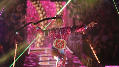 WWE Raw Women's champion Bianca Belair comes to the ring.