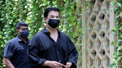 Director Karan Johar arrives to pay his respects at the residence of Indian actor Dilip Kumar after he died in a hospital in Mumbai on July 7, 2021.