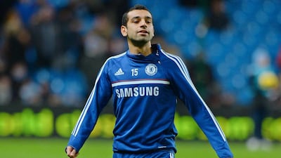 Mohamed Salah warms up before his Premier League debut with Chelsea in February. Andrew Yates / AFP / February 3, 2014