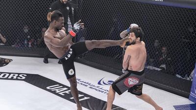 Jaures Dea on target against Andre Pinheiro. Courtesy UAE Warriors