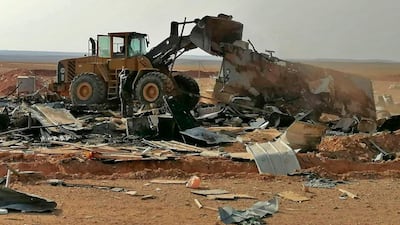 The Iranian-backed militia said Monday that the death toll from strikes in Iraq and Syria against its fighters has risen to 25. AP Photo