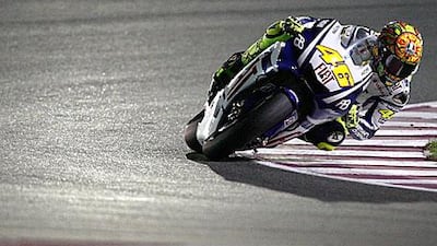 Valentino Rossi swoops round a corner during practice at the Losail circuit for today's Grand Prix of Qatar.