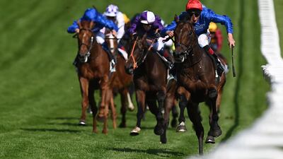 Adayar, ridden by Adam Kirby, on the way to winning the Epsom Derby. AFP