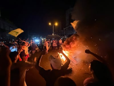 Hezbollah supporters take to the streets of Beirut's southern suburbs to protest against Lebanon's plan to disarm the group. AFP