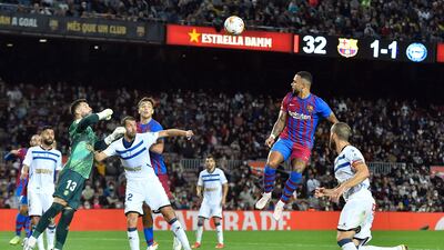Barcelona's Dutch forward Memphis Depay heads the ball. AFP
