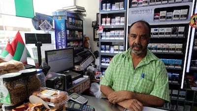 Abu Dhabi shopkeepers like Mohammed Jamal, say VAT could have an impact on sales. Chris Whiteoak / The National