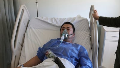 A Chinese patient in hospital in Aqaba after the chlorine gas explosion on June 28. AP