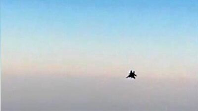An image grab from a video released by state-run Iran Press news agency reportedly shows a fighter jet seen from the Mahan Air plane after it was intercepted by a US F-15 while flying over Syria. AFP