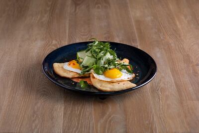 Fried eggs on naan bread. Courtesy Coffee Club