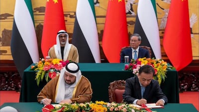 Sheikh Khaled bin Mohamed, Crown Prince of Abu Dhabi, witnessing the signing of an agreement between the UAE and China to boost the flow of investment capital, in Beijing. Photo: Ministry of Investment