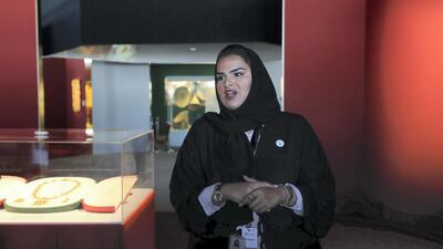 Salama Al Shamsi, senior project manager at Zayed National Museum, tells of the history behind some of the jewellery on display at the festival. Chris Whiteoak / The National