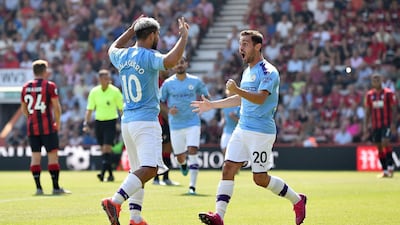 Manchester City's Sergio Aguero celebrates with Bernardo Silva. AFP