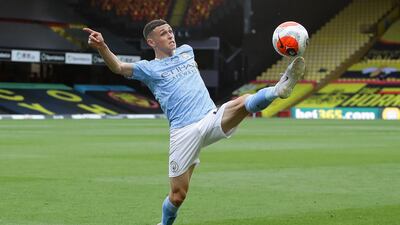 Manchester City's English midfielder Phil Foden controls the ball at Vicarage Road. AFP