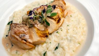 Lemon risotto with corn-fed chicken and foie gras sauce.